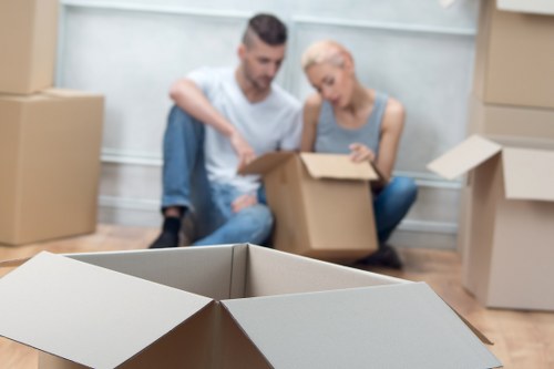 Packed storage boxes and household items ready for a Shepherdsbush storage unit